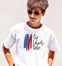 Load image into Gallery viewer, A man in a For Liberty Sake t shirt.